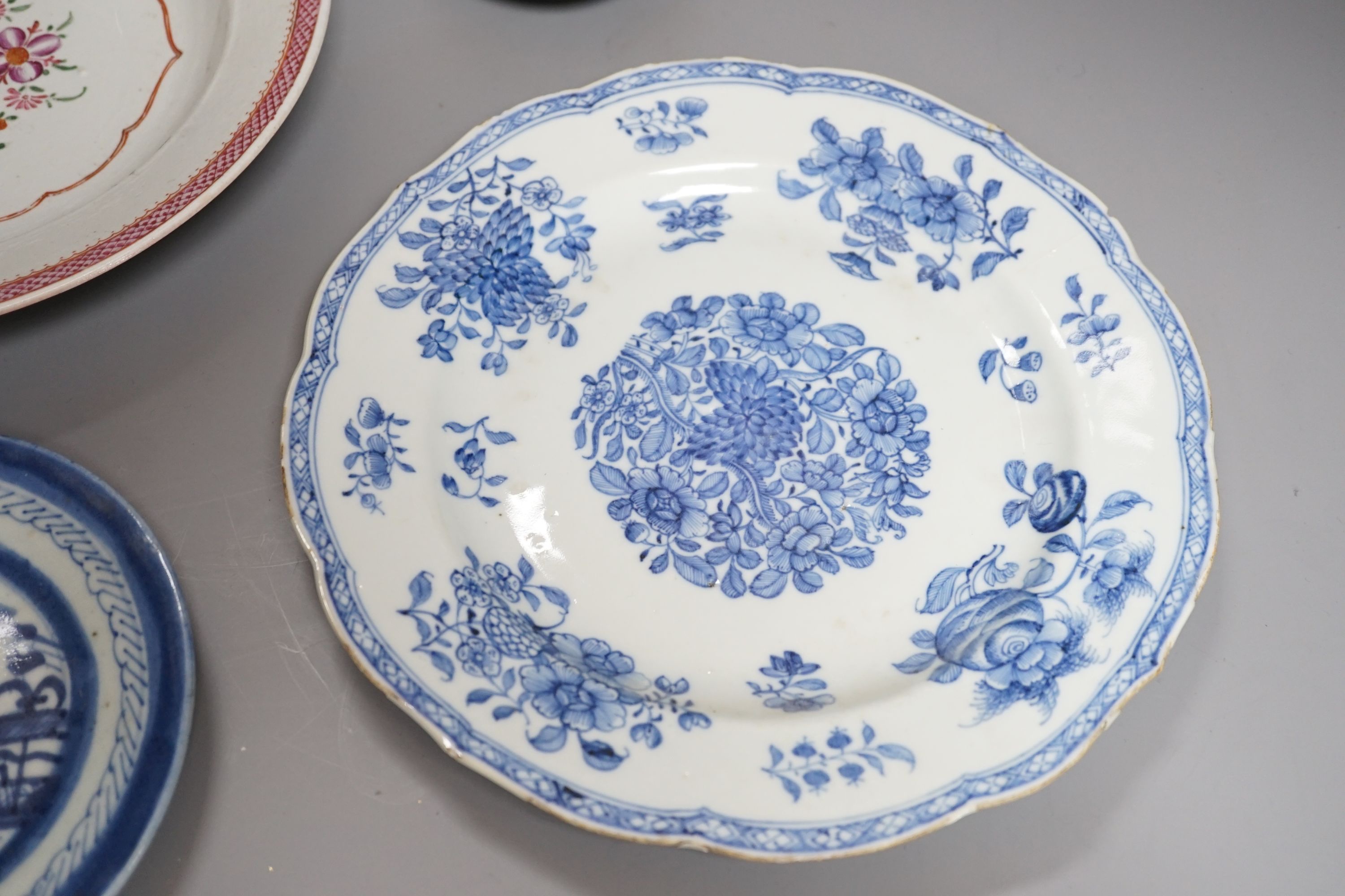 An 18th century Chinese export blue and white dish, 23cm, together with three other Chinese ceramic items